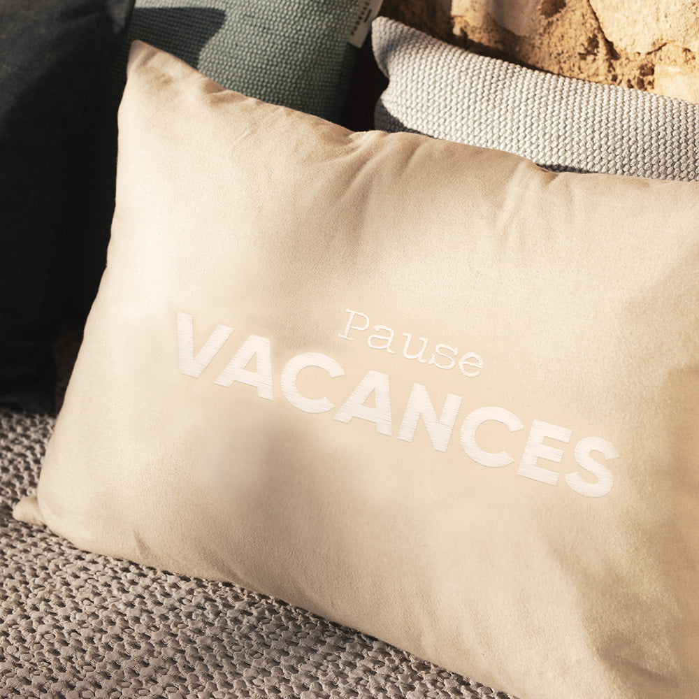 Holiday embroidered cushion