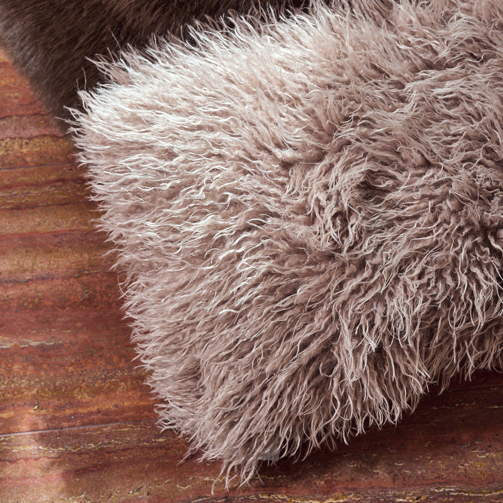 Coussin en fausse fourrure Sienne