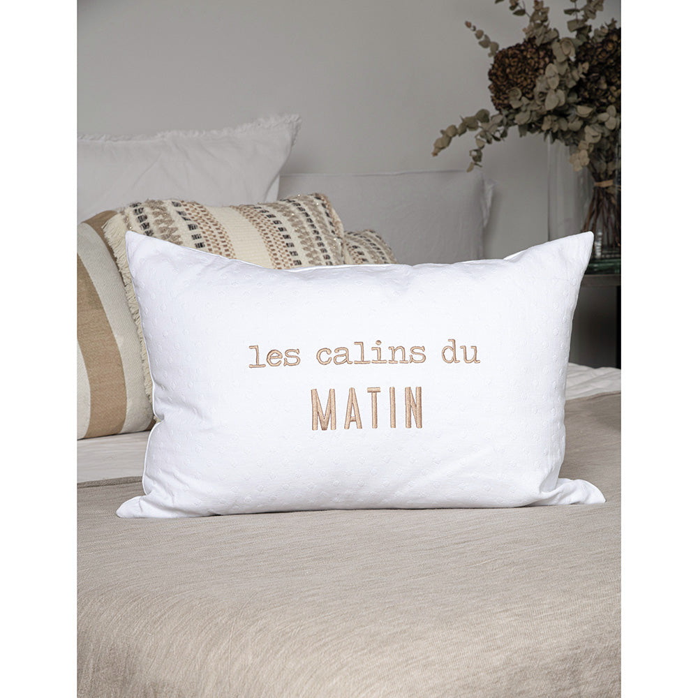 Cuddly embroidered cushion