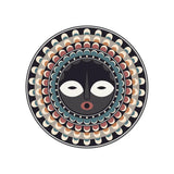Laissez-vous séduire par le motif masque africain coloré de ce set de table rond au format ? 38cm en vinyle imprimé.